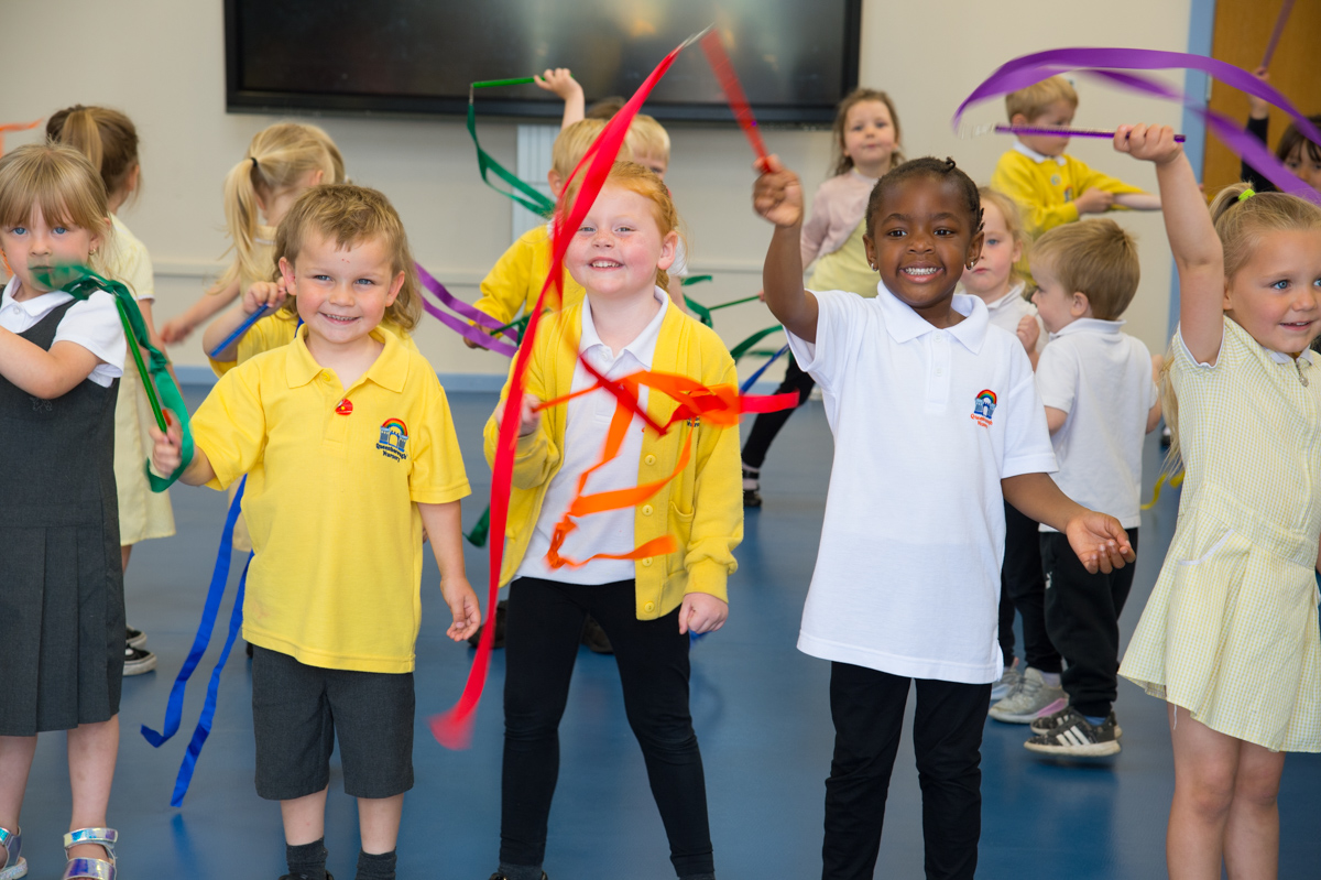 Children dancing with streamers